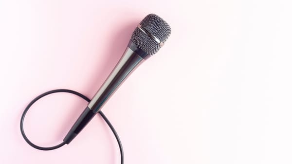 microphone with pink background; article: 23 Audition Songs For 'Legally Blonde'