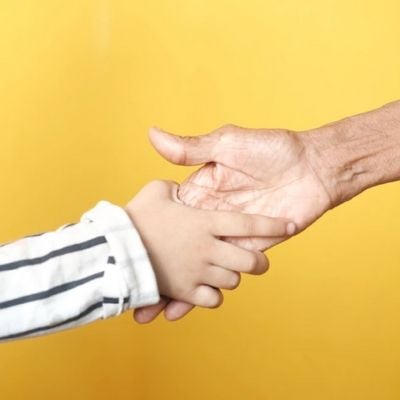 shaking hands (adult and child)