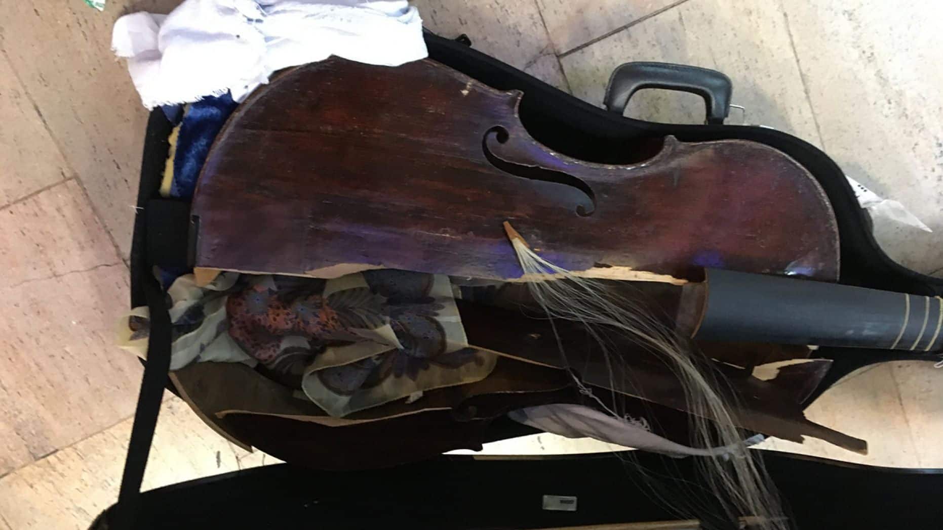 how to travel with musical instruments - broken violin